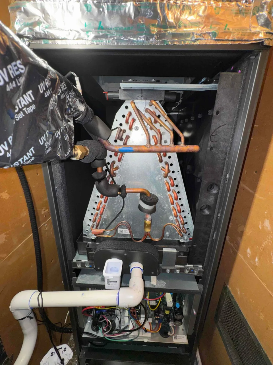 Mitsubishi ducted heat pump indoor equipment opened for maintenance inspection in San Jose