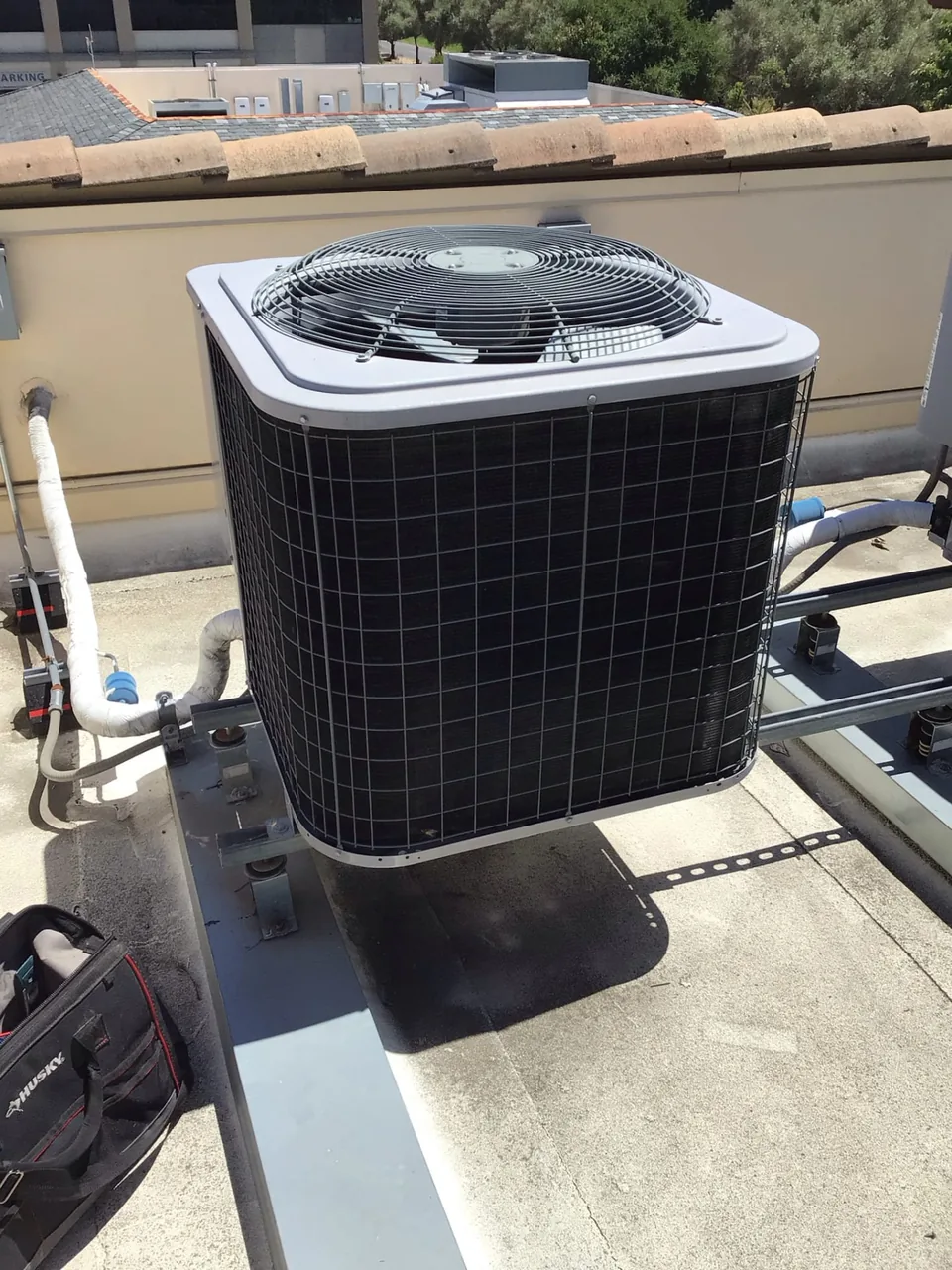 Outdoor heat pump unit at a residential condo in Los Altos CA 94022