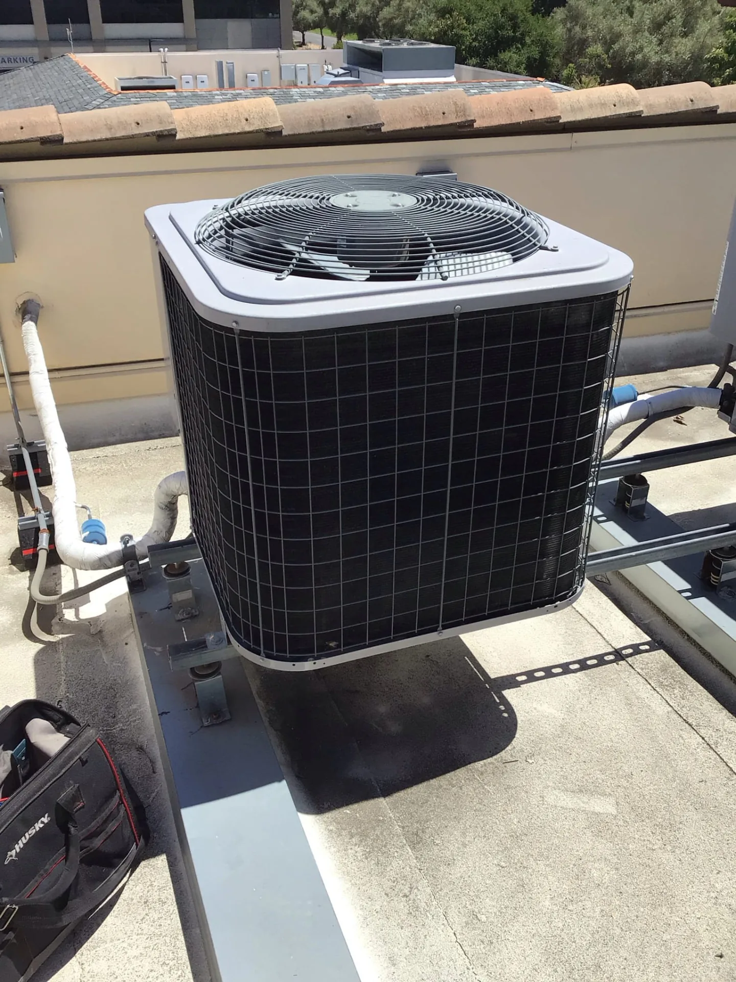 Outdoor heat pump unit at a residential condo in Los Altos CA 94022