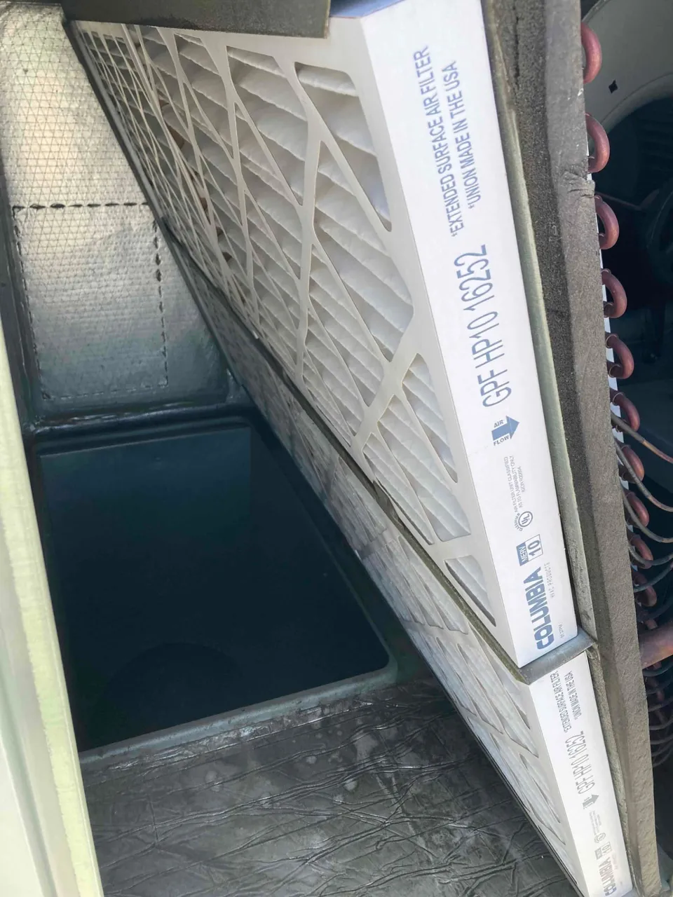 New replacement air filters installed in a rooftop package unit in Santa Clara CA 95050