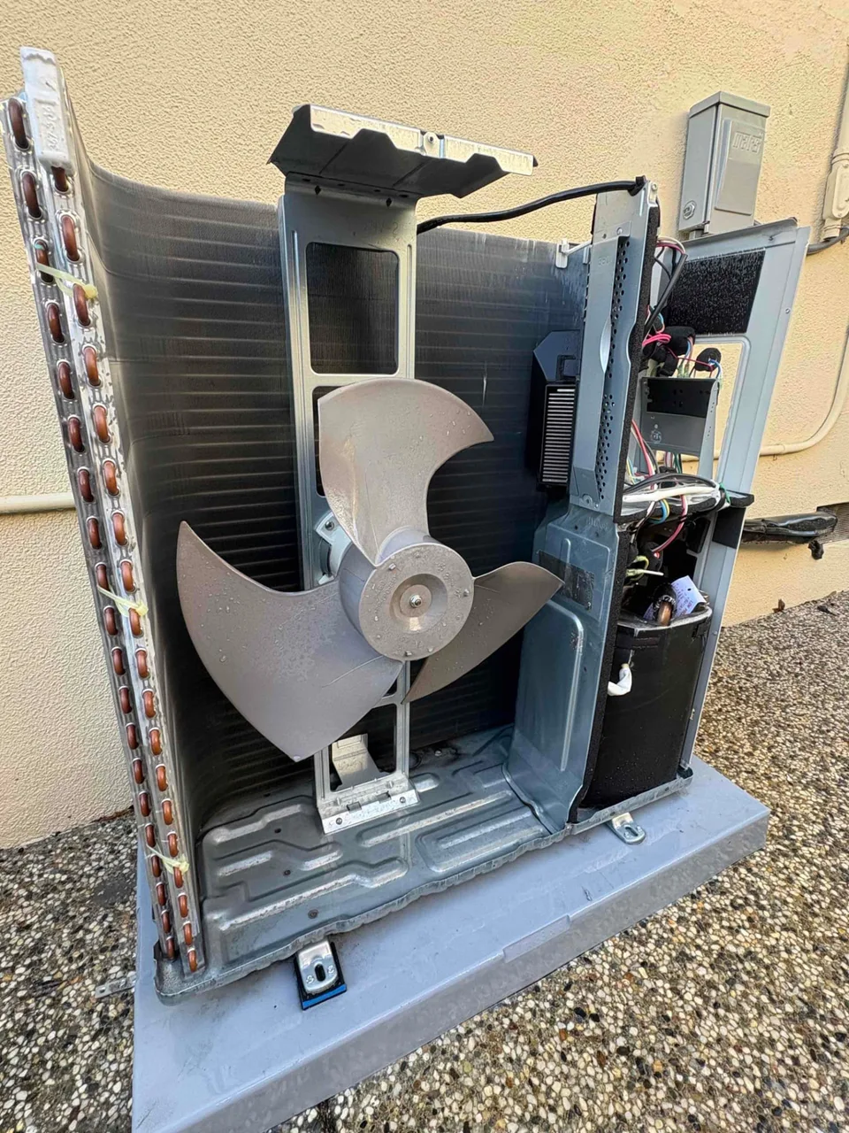 Mitsubishi ducted heat pump opened for detailed maintenance inspection in San Jose