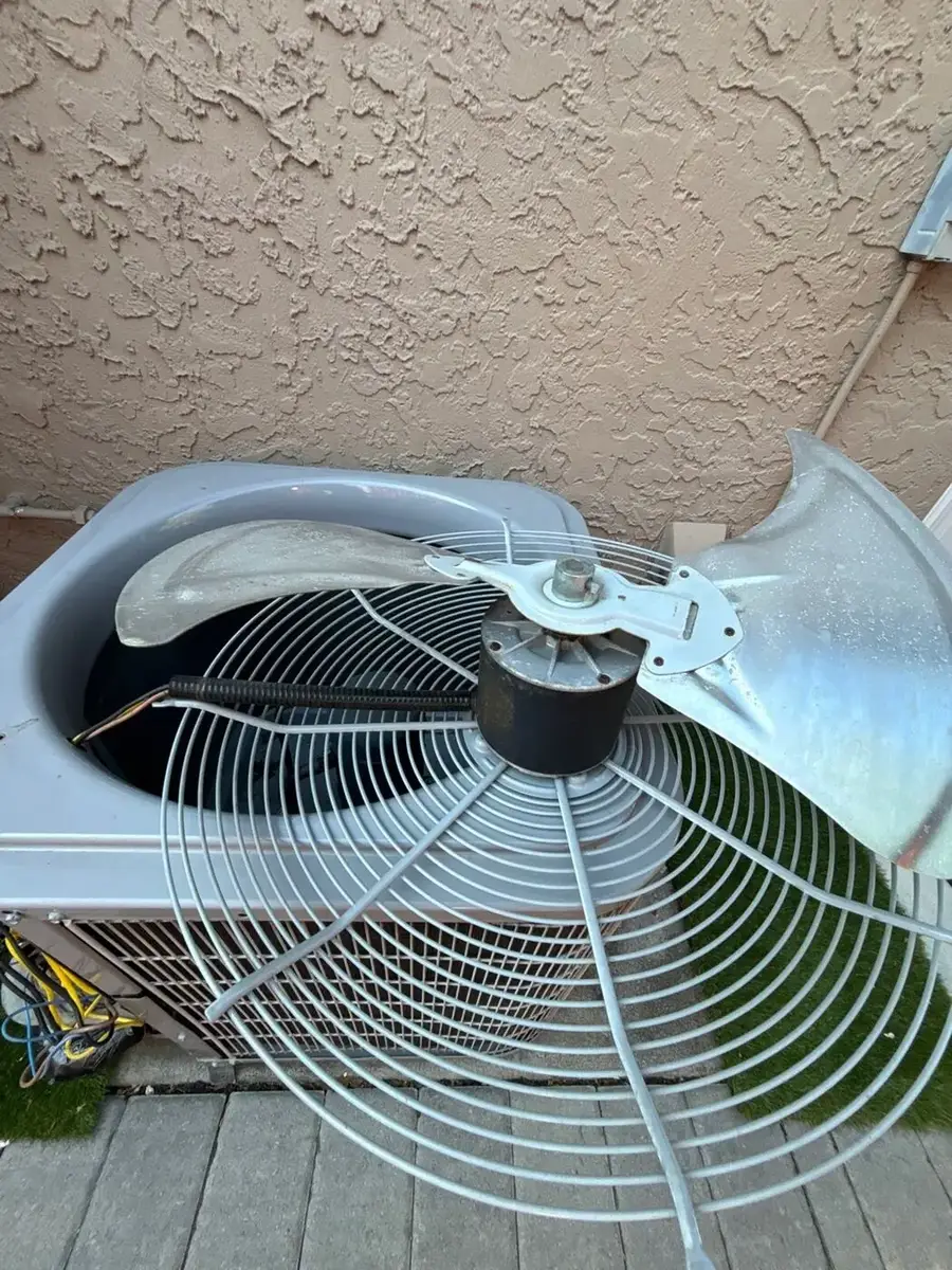 Outdoor AC condenser fan motor with blade removed for maintenance in Mountain View, CA 94040