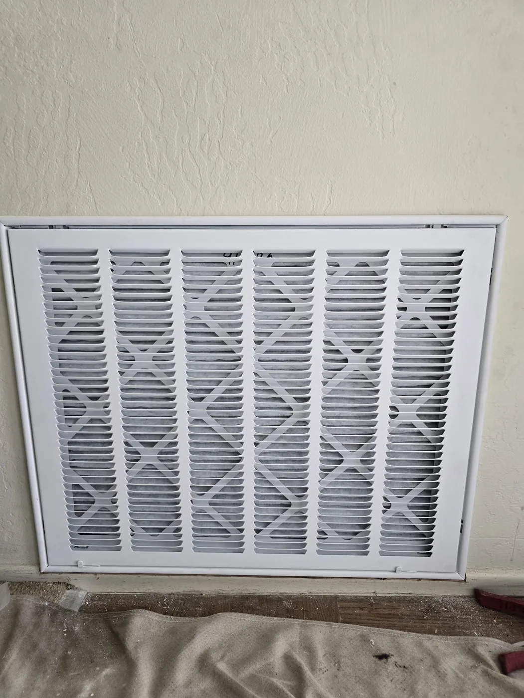 New large white return-air grille installed on an interior wall in a Mountain View, CA 94040 home