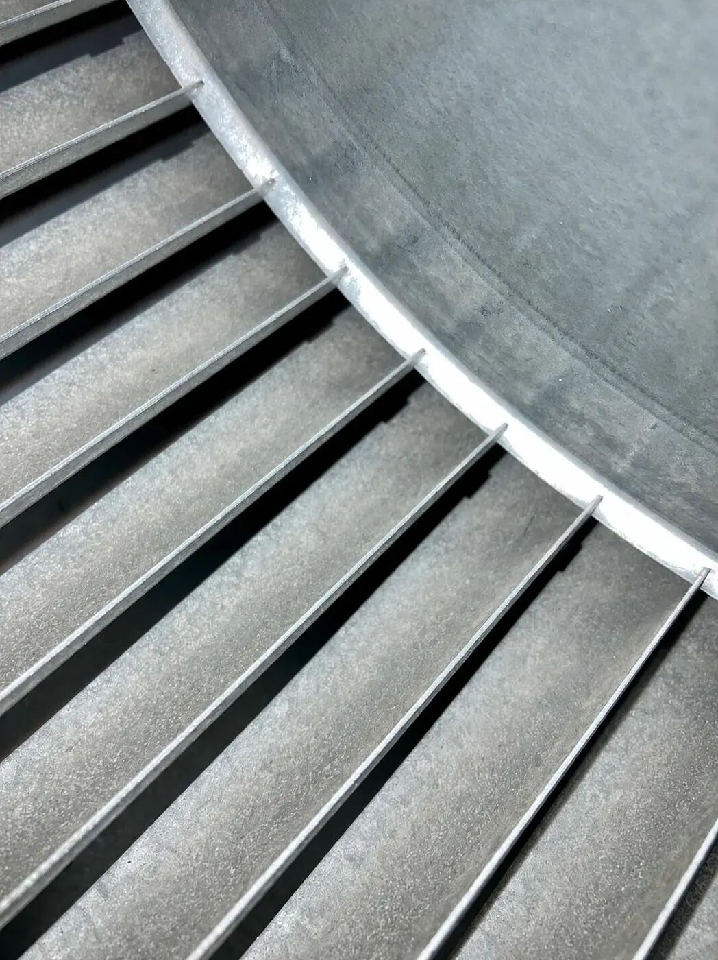 Condenser fins inside an outdoor air conditioning unit in Saratoga, CA 95070
