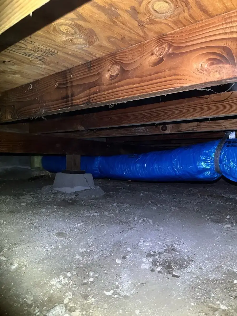 New R-8 blue antimicrobial ductwork installed in the crawlspace beneath the floor joists