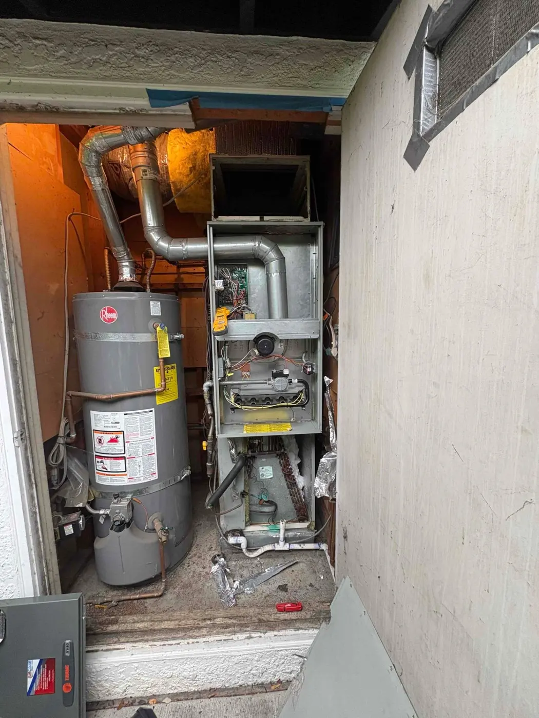 Trane furnace and water heater closet during routine maintenance in Sunnyvale, CA 94086